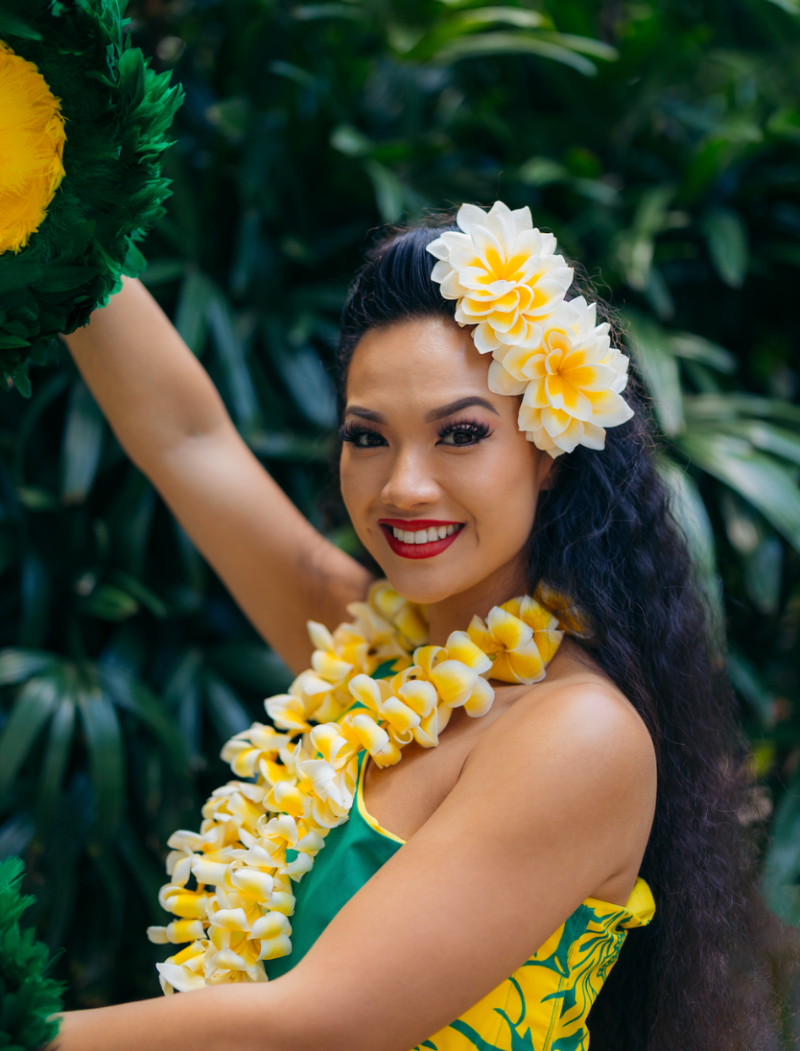 unnamed (1) a person holding a flower